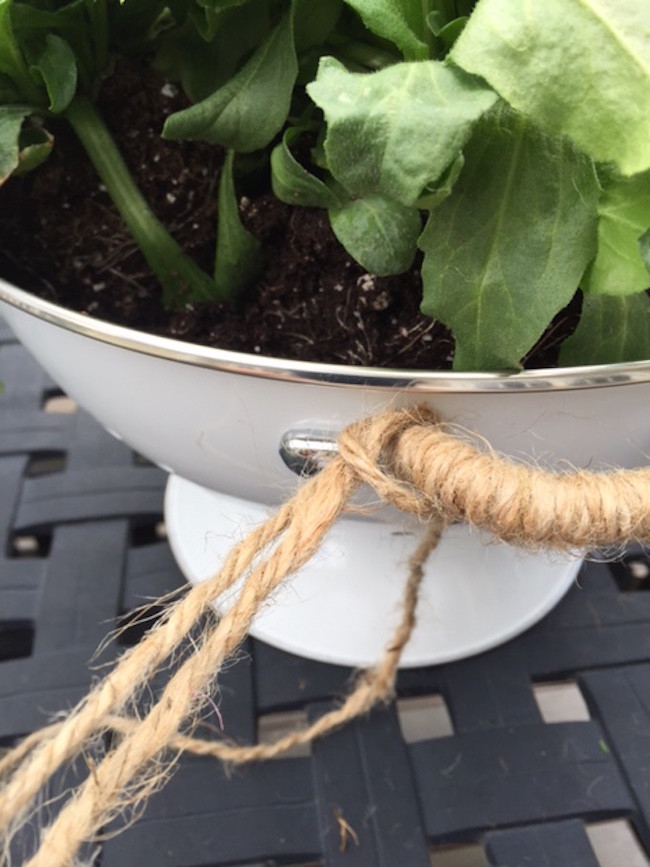 String wrapped around colander