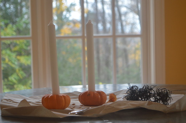 Place Candles in Pumpkin Holders