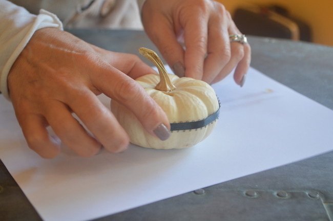 glue ribbon on mini white pumkin place card