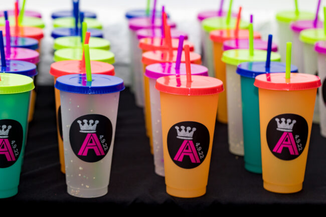 Logo'd beverage tumblers party favors.