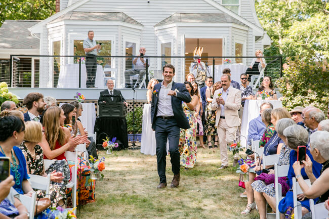 Groom walking in with coconuts from Monty Python