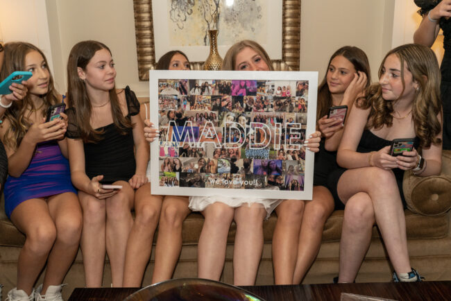 Friends making presentation to Mitzvah girl