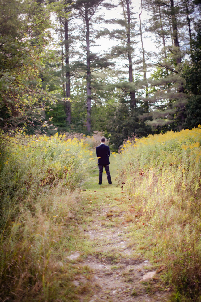 Groom awaiting bride for first look