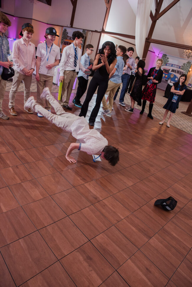 party guest teen breakdancing