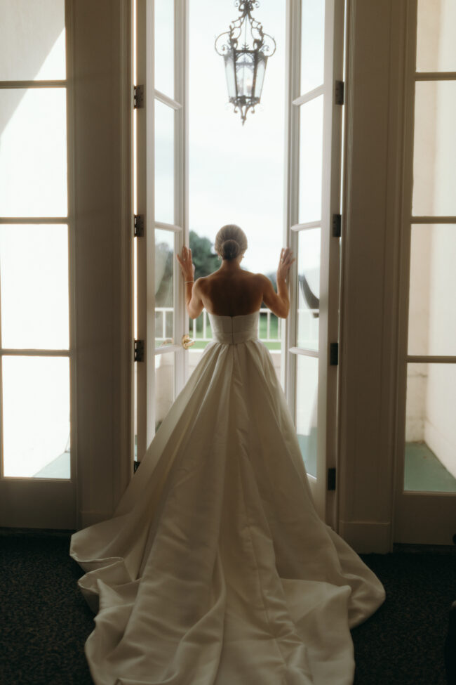 bride getting some fresh air before first look