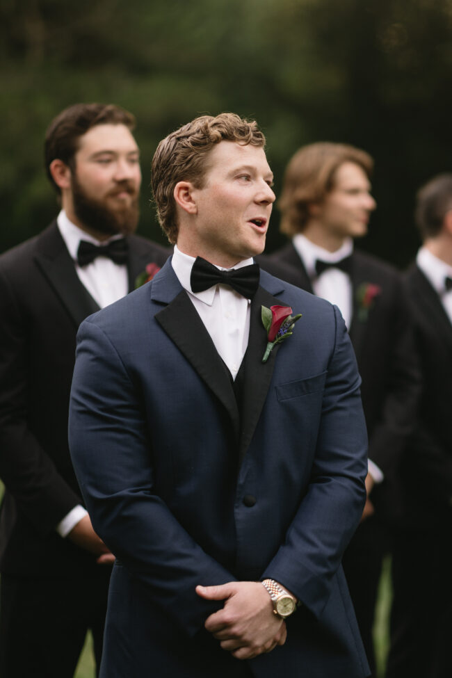 Groom seeing bride for first time down the aisle
