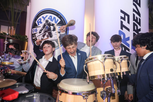 mitzvah boy playing drums