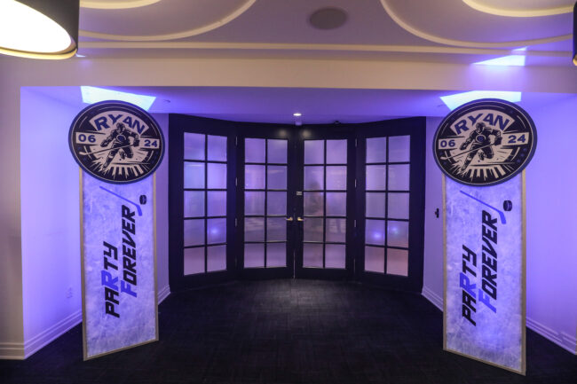 Logo-lined tunnel leading to reception