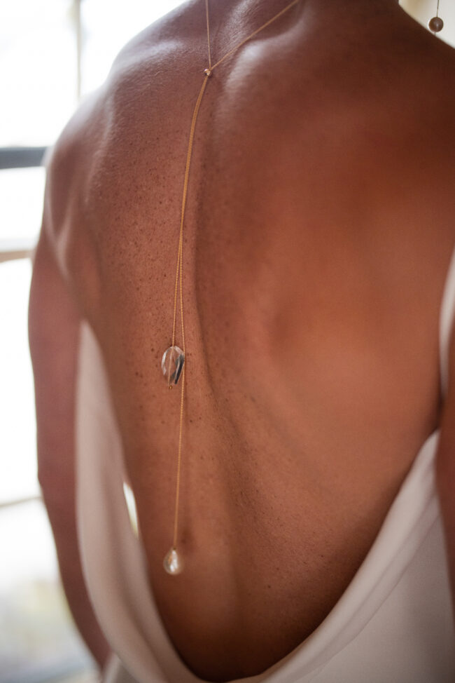 Back of wedding dress with necklace