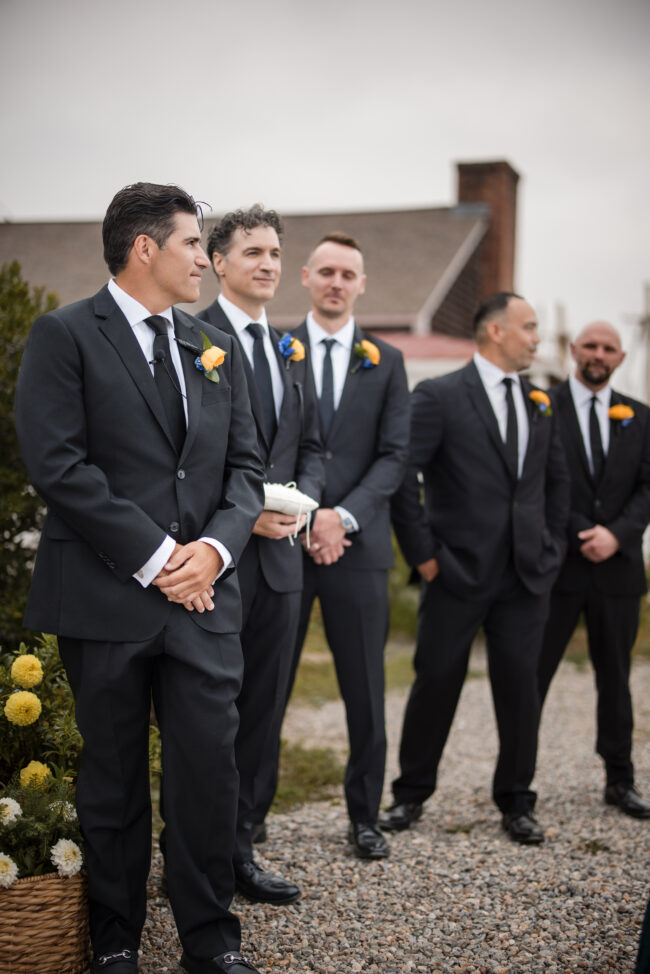 Groom and groomsmen in position for the ceremony