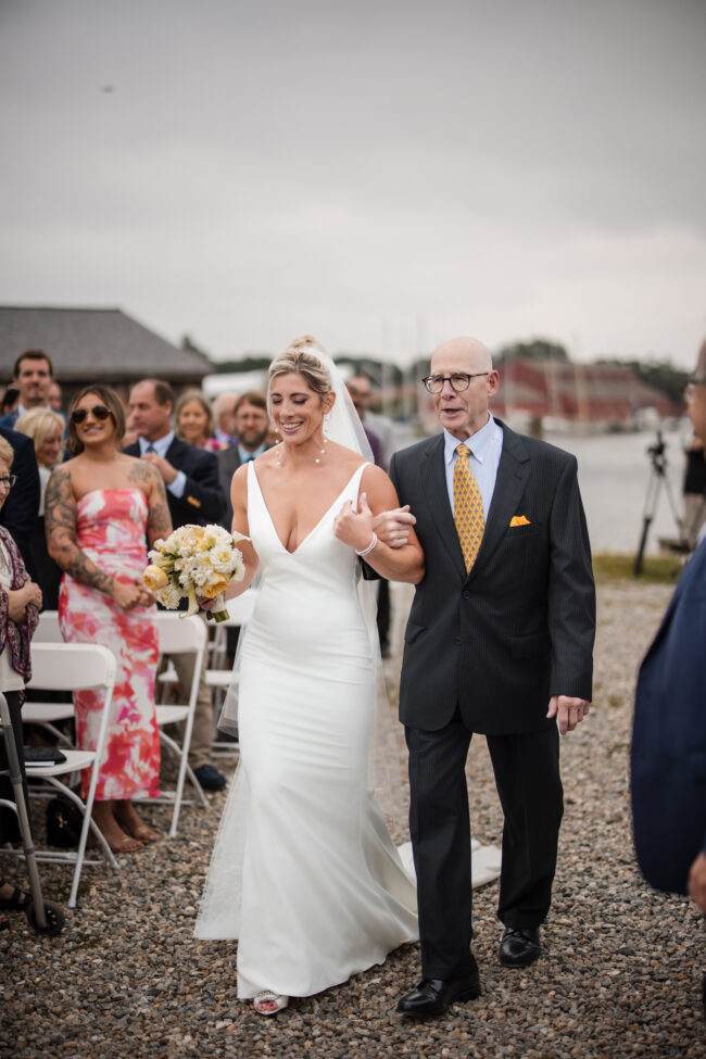 Bride walking down aisle with dad