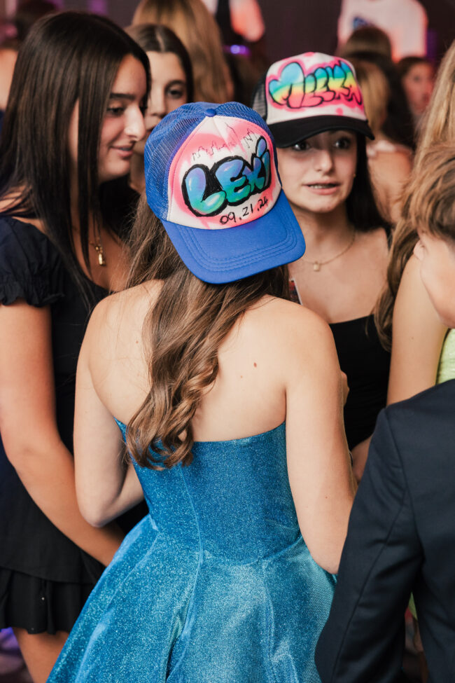 Mitzvah girl showing off custom airbrushed lid