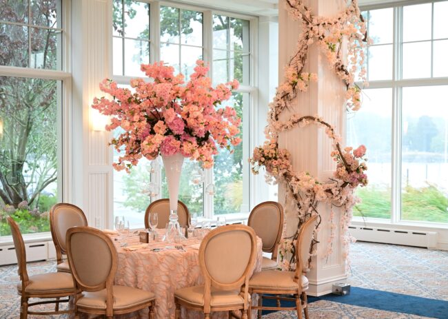 Adult tablescape with floral centerpiece and other floral decor