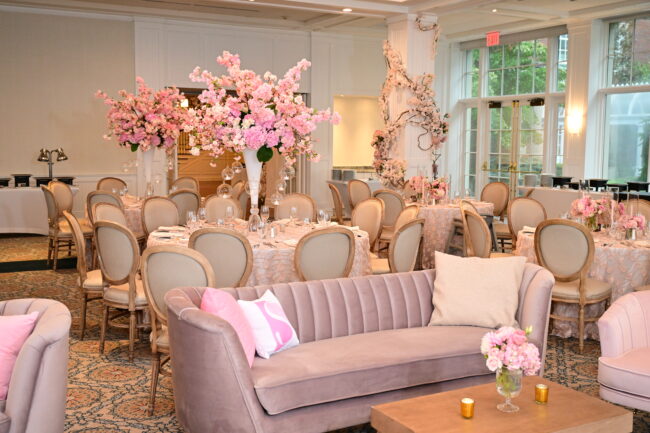 Boho Chic lounge setup with giant floral centerpieces