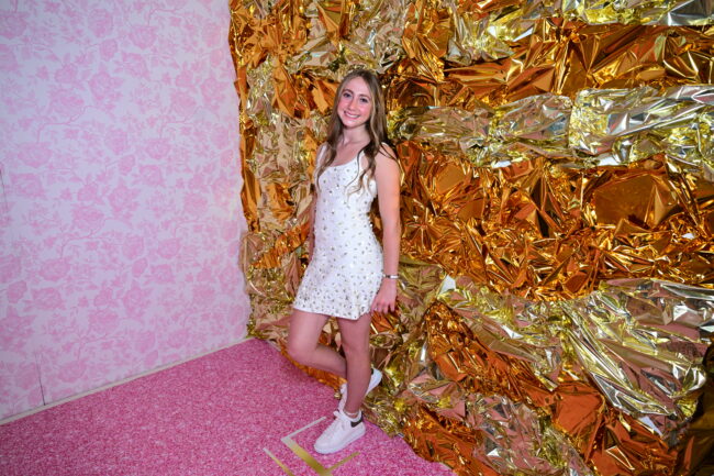 Mitzvah girl posing at 3D photobooth