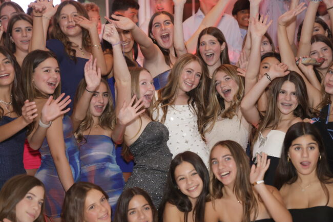 Mitzvah girl posing with friends