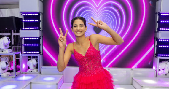 Mitzvah girl posing in front of LED wall