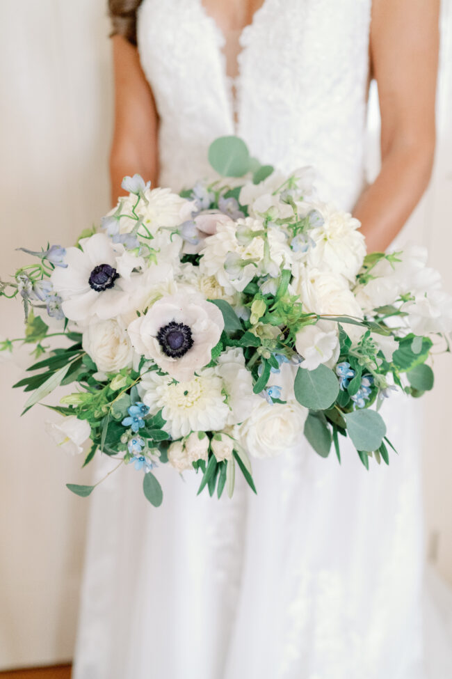 Bride holding bouquet prior to ceremony