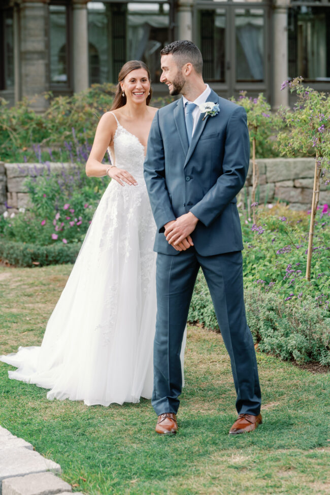 Soon-to-be Bride and Groom posing for first look