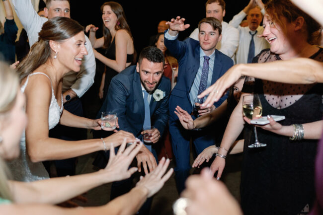 Bride and Groom partying at their reception