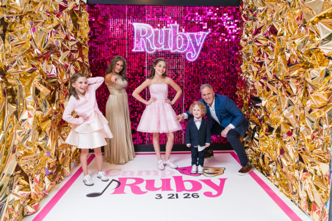Family posing at 3D immersive photo booth
