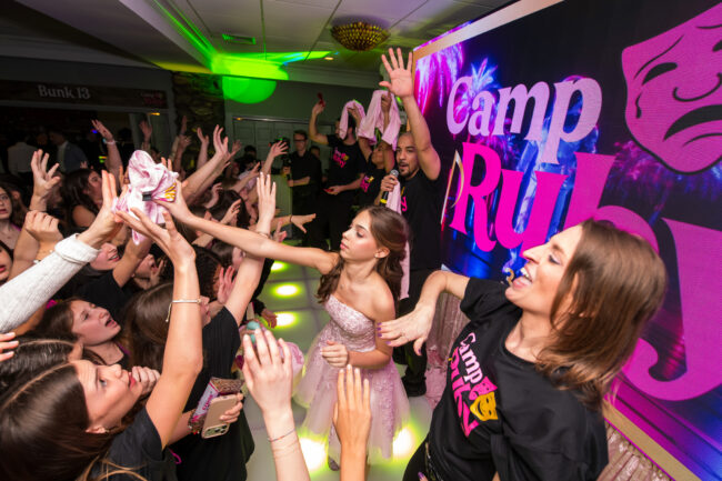 Mitzvah girl tosses out dance floor giveaways