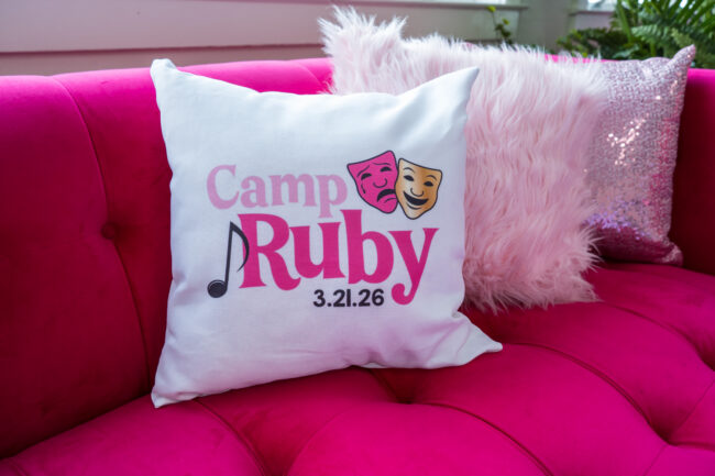 Logo'd pillows in teen lounge